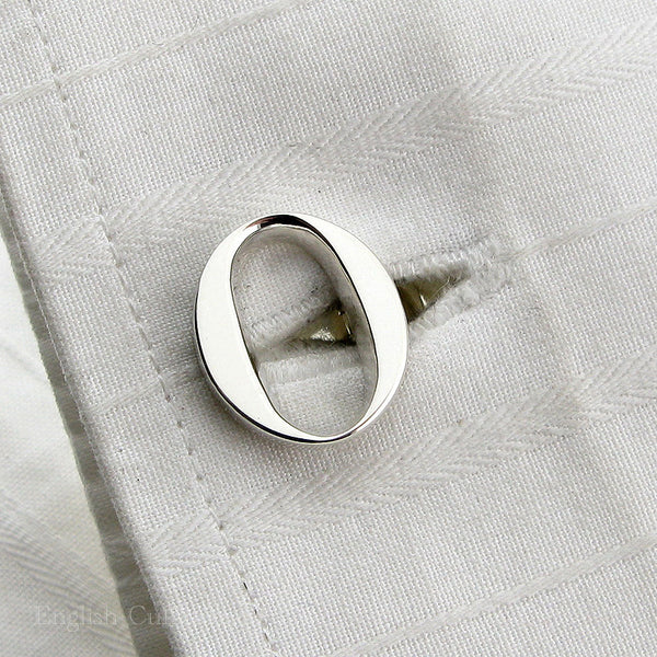 O initial cufflink