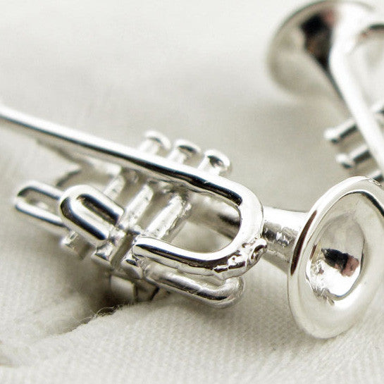 Close-up of Sterling silver trumpet cufflinks from English Cufflinks