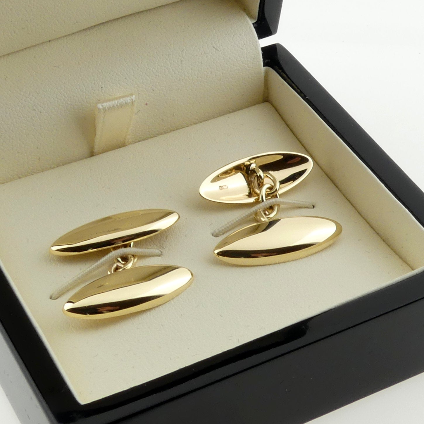 long domed oval gold cufflinks showing the back